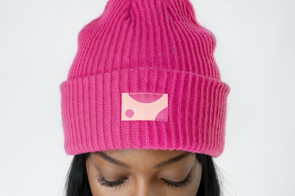 Black woman wearing a hot pink beanie mockup